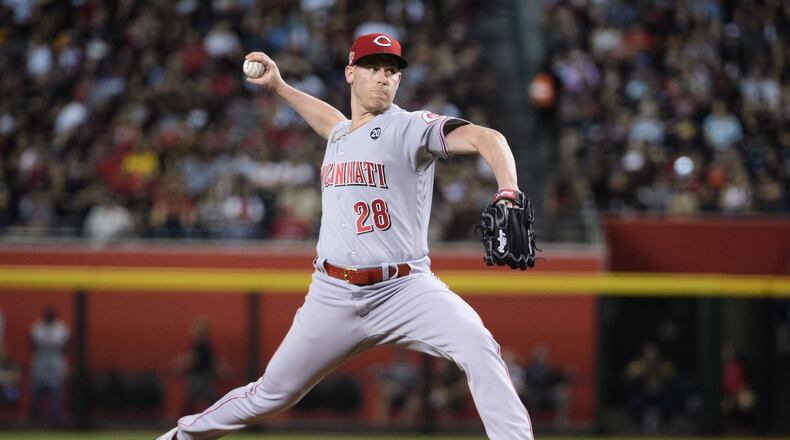 PHOENIX, ARIZONA - SEPTEMBER 14: Anthony DeSclafani #28 of the Cincinnati Reds delivers a pitch in the first inning of the MLB game against the Arizona Diamondbacks at Chase Field on September 14, 2019 in Phoenix, Arizona. (Photo by Jennifer Stewart/Getty Images)