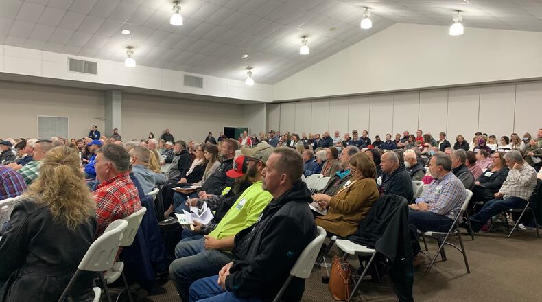 In this Nov. 2021 photo, individuals pack the Assembly Hall at the Greene County fairgrounds for a local public hearing, testifying for or against the Kingwood Solar project. LONDON BISHOP/STAFF