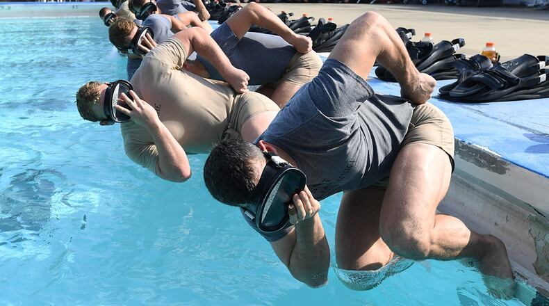 Special Warfare trainees from the 352nd Special Warfare Training Squadron participate in a physical training session at the Triangle Pool on Keesler Air Force Base, Miss., Aug. 9, 2019. (U.S. Air Force photo/Kemberly Groue)