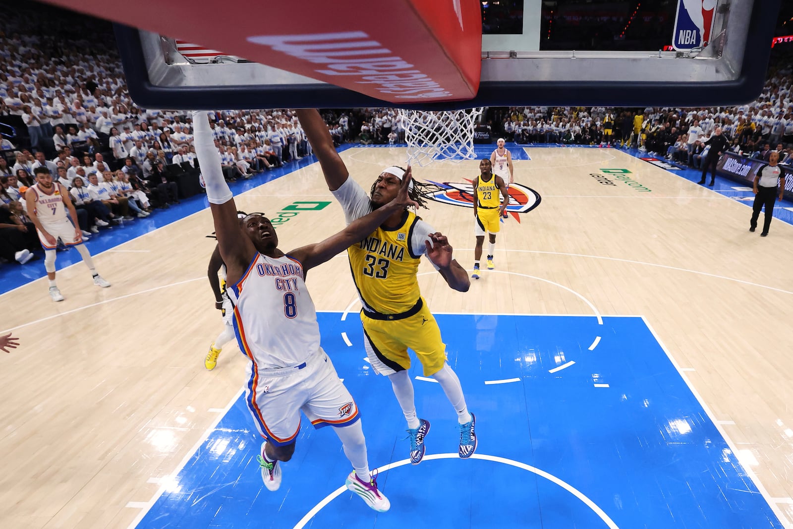 Oklahoma City Thunder forward Jalen Williams (8) shoots against Indiana Pacers center Myles Turner (33) during Game 1 of the NBA Finals basketball series Thursday, June 5, 2025, in Oklahoma City. (Matthew Stockman/Pool Photo via AP)