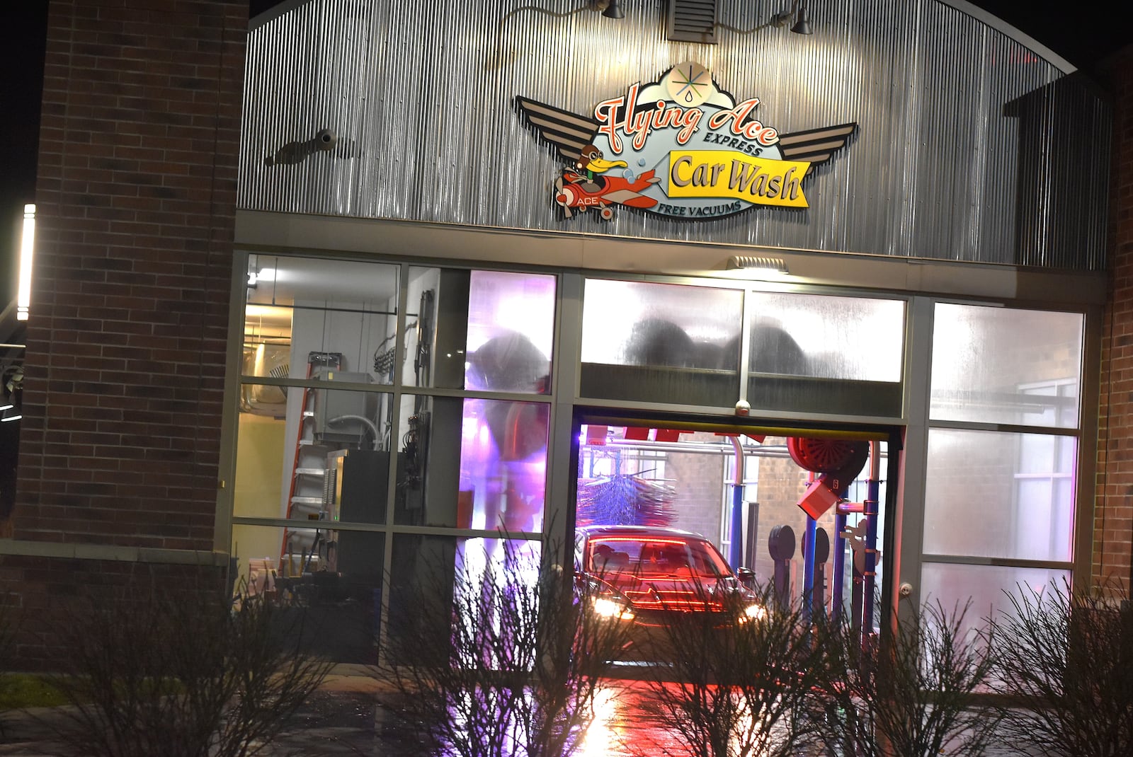 A car goes through the Flying Ace Express Car Wash at 1901 W. Dorothy Lane near the Walmart in Moraine. CORNELIUS FROLIK / STAFF