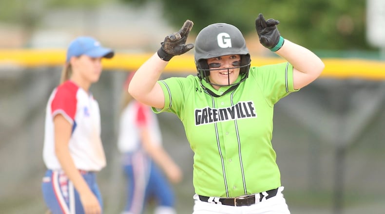 Greenville’s Alli Hill celebrates after an RBI double against Clinton-Massie in a Division II regional semifinal on Wednesday, May 24, 2017, at Mason High School. David Jablonski/Staff