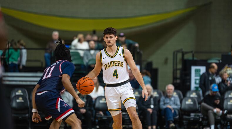 Wright State's Keaton Norris surveys the Robert Morris defense during Sunday's game at the Nutter Center. Jordan Wommack/Wright State Athletics