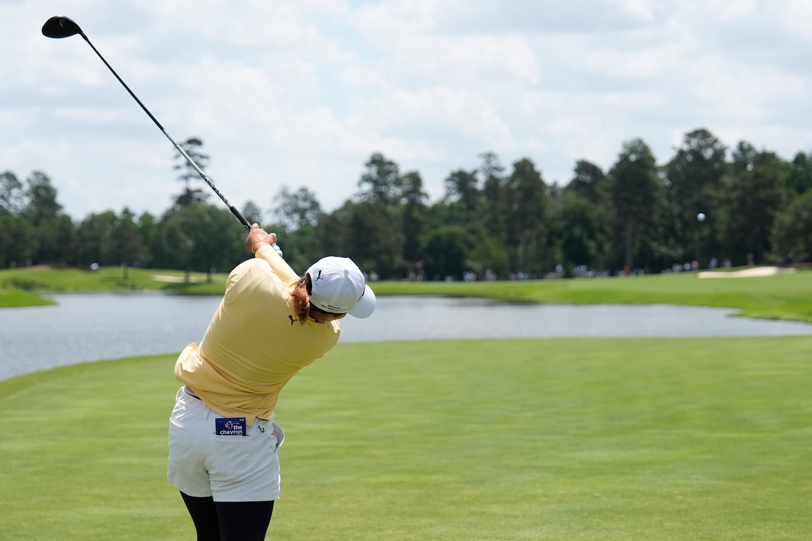 Mao Saigo, of Japan, hits from the fourth tee during the final round of the Chevron Championship LPGA golf tournament Sunday, April 27, 2025, in The Woodlands, Texas. (AP Photo/Ashley Landis)