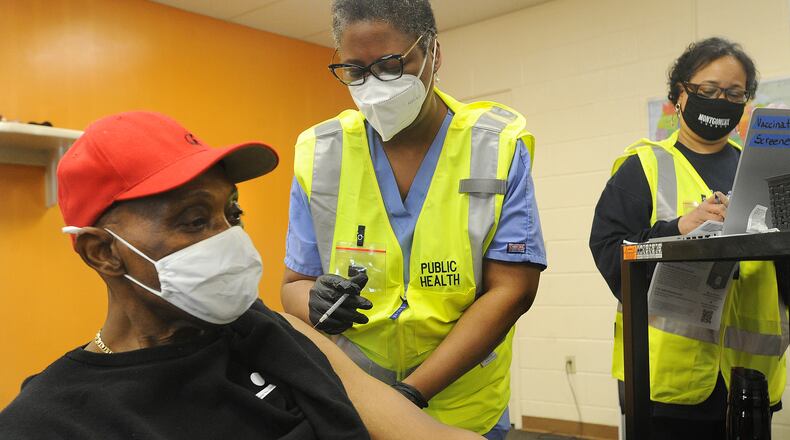 Ulysses S. Grant Jr. received his COVID-19 vaccination at the Bethesda Temple vaccination site on Salem Avenue in Harrison Twp. Monday morning, March 8, 2021. MARSHALL GORBY\STAFF