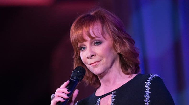 PHOENIX, AZ - MARCH 09:  Reba McEntire speaks onstage at the Celebrity Fight Night's Founders Club Dinner on March 9, 2018 in Phoenix, Arizona.  (Photo by Emma McIntyre/Getty Images for Celebrity Fight Night)