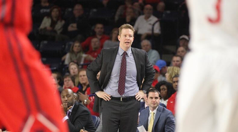 Richmond coach Chris Mooney watches the action during a game against Dayton on Tuesday, March 1, 2016, at the Robins Center in Richmond, Va. David Jablonski/Staff