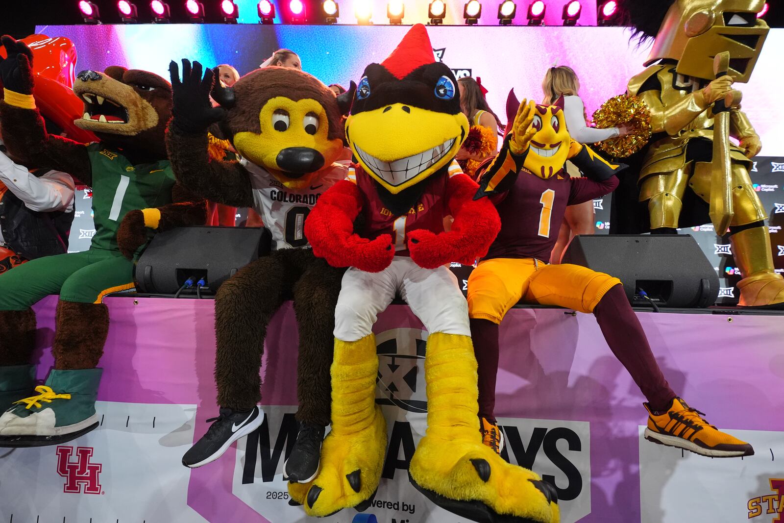 Mascots pose for photos during the Big 12 NCAA college football media days in Frisco, Texas, Tuesday, July 8, 2025. (AP Photo/LM Otero)
