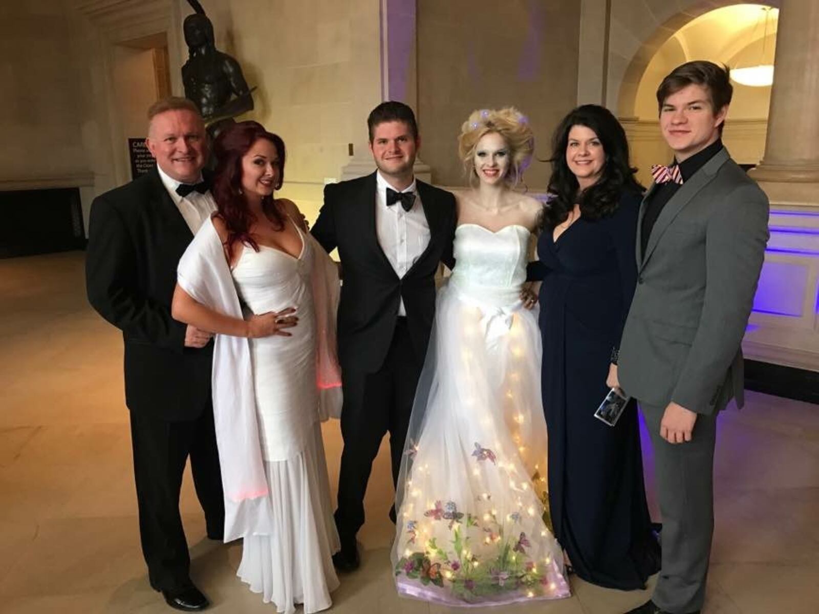 Hanson with her family at a Dayton Art Institute gala. "My daughter was a living statue at this fundraiser, that’s why she looks ghostly white!"