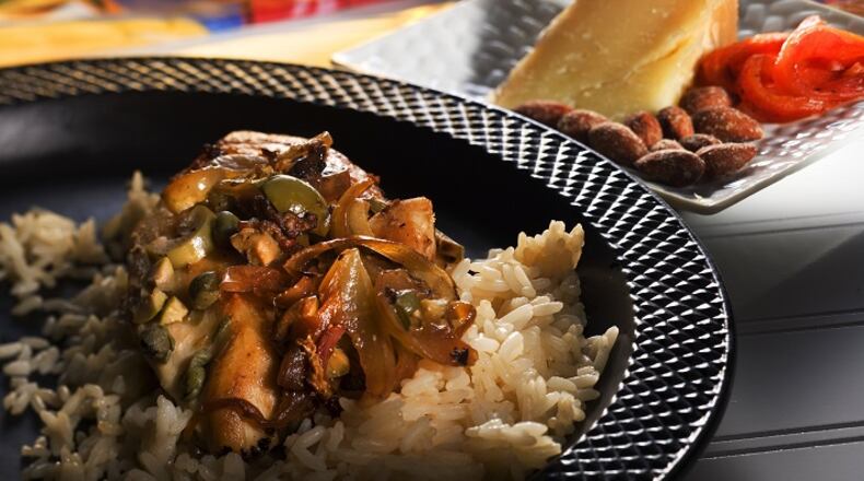 Made with olive oil, green olives, capers and dry sherry, this easy chicken recipe is a salute to Spain. (Bob Fila/Chicago Tribune/TNS)