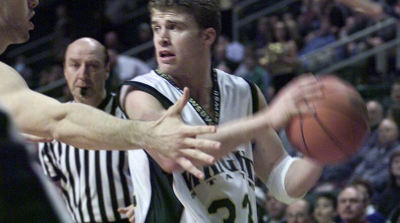 Jesse Deister, a senior and guard on the Wright State basketball team, looks to pass the ball in first half action. Wright State hosted Oakland University at the Nutter Center on Dec. 11, 2001. FILE PHOTO