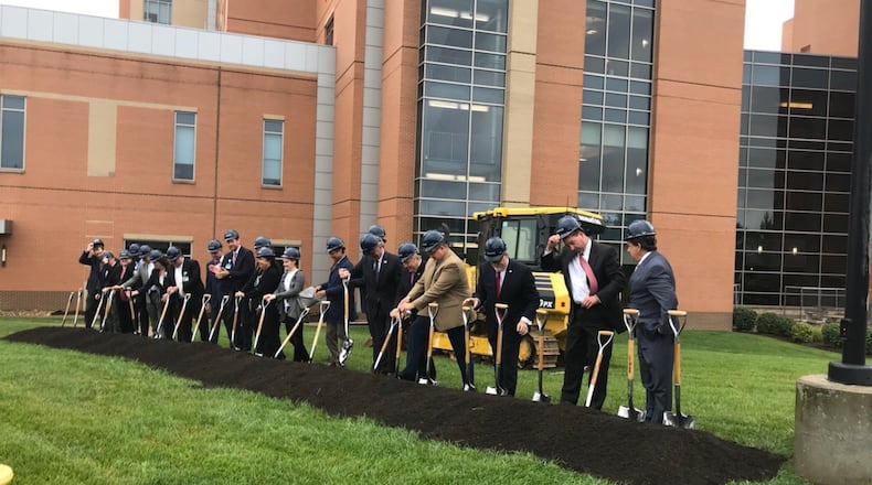 Kettering Health officials break ground on a new 170,000 square-foot tower at Soin Medical Center on Sept. 10, 2018. KAITLIN SCHROEDER/STAFF