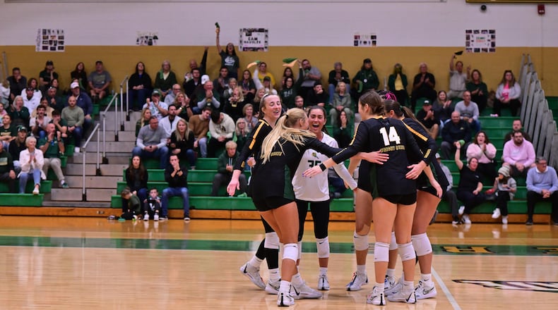 Wright State volleyball players celebrate a winning point earlier this season vs. Purdue Fort Wayne. The Raiders clinched an outright Horizon League regular-season title this weekend. Joe Craven/Wright State Athletics