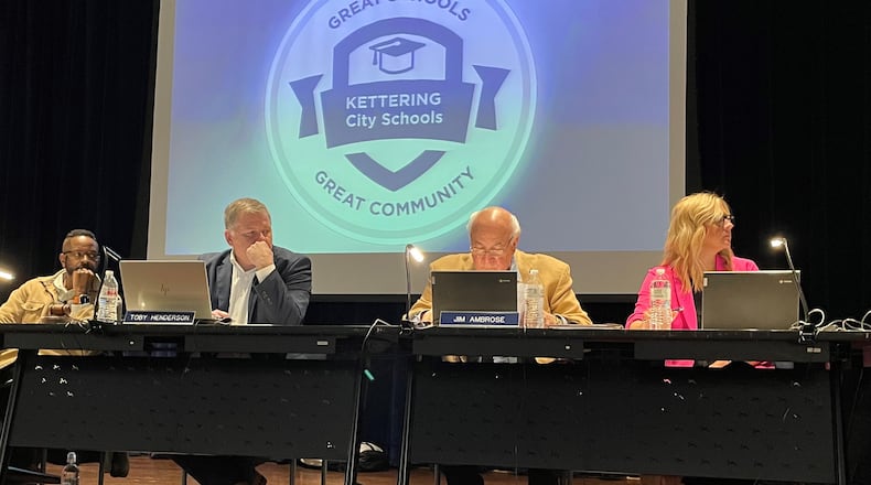 The Kettering City School District board of education plans to meet Tuesday, Wednesday and Thursday to interview candidates for a vacant seat created by Jim Ambrose (second from right) stepping down. NICK BLIZZARD/STAFF