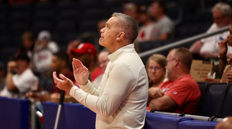 Ohio State coach Chris Holtmann watches Carmen's Crew in the first round of The Basketball Tournament on Wednesday, July 26, 2023, at UD Arena in Dayton. David Jablonski/Staff