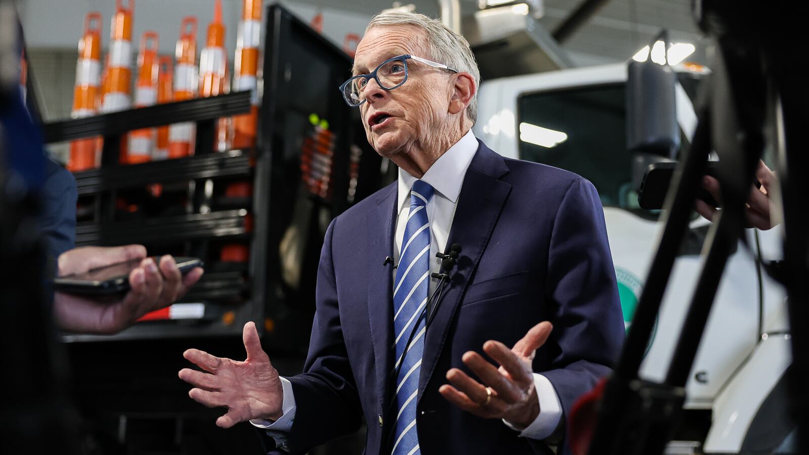 Gov. Mike DeWine talks during a group interview following a news conference Thursday, April 3, 2025, at Ohio Department of Transportation's Moraine facility. DeWine and ODOT personnel announced $3.2 billion in projects. BRYANT BILLING / STAFF