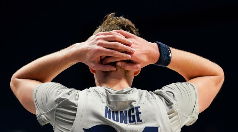 Xavier's Jack Nunge (24) reacts during the second half of an NCAA college basketball game against Villanova, Wednesday, Jan. 12, 2022, in Cincinnati. (AP Photo/Jeff Dean)