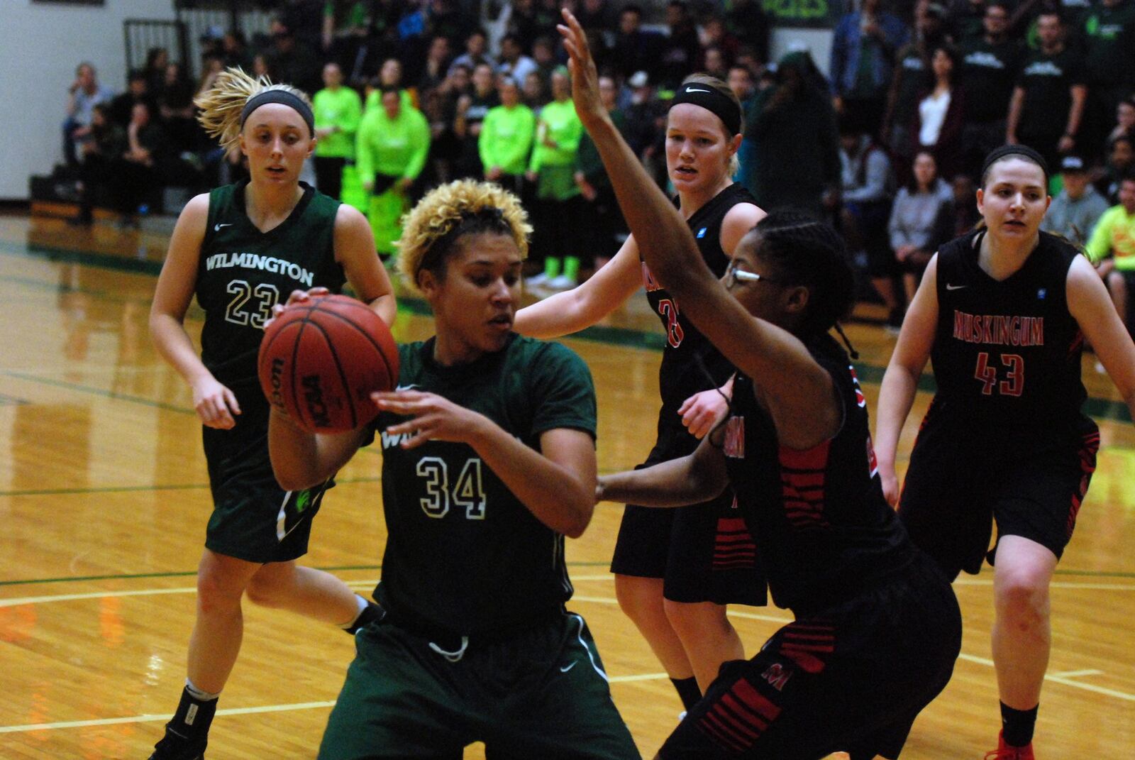 Ja Cole Tabor (No. 34) handles the ball against Muskingum players earlier this season. CONTRIBUTED PHOTO