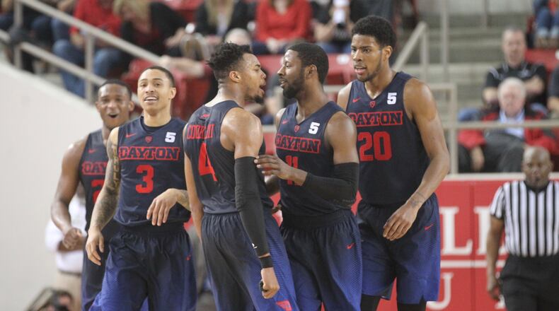 Dayton's Charles Cooke reacts after Scoochie Smith's third 3-pointer in overtime against Davidson on Friday, Feb. 24, 2017, at Belk Arena in Davidson, N.C.