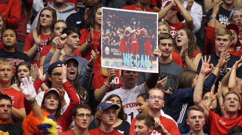 Dayton fans cheer during an exhibition game vs. Findlay at UD Arena. David Jablonski/Staff