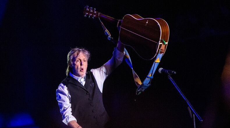 Paul McCartney, seen here performing at the 2022 Glastonbury Festival in Somerset, England, wrote his "Liverpool Oratorio" in collaboration with the late composer and conductor Carl Davis. The work, which premiered in 1991, will receive its first-ever operatic staging July 18-27 courtesy of Cincinnati Opera. (Photo by Joel C Ryan/Invision/AP, File)