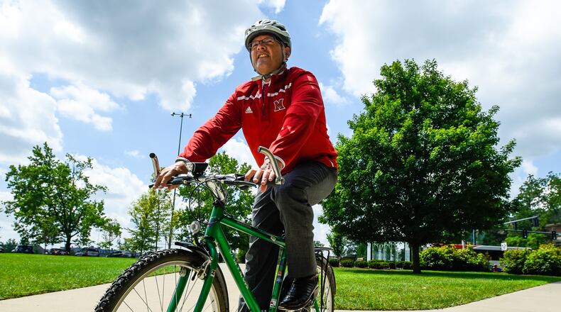 Miami University President Dr. Gregory Crawford (pictured) is the keynote speaker for the 7th bi-annual Butler County National Philanthropy Day. He and his wife, Dr. Renate Crawford, have bicycled across the country to raise awareness and funds for research on Niemann-Pick Type C Disease, a rare and deadly neurodegenerative disease. NICK GRAHAM/2016