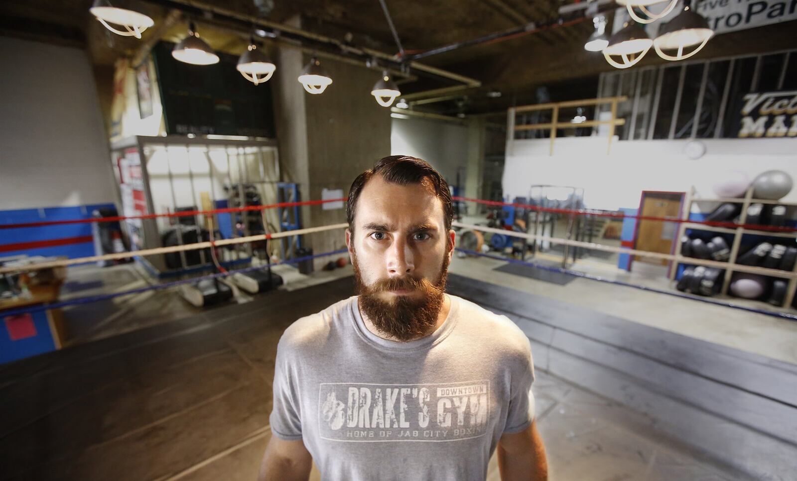 Warren Roberds, 29, headlines an MMA card in Akron on July 29. Roberds, who launched his professional career in Las Vegas, now trains in downtown Dayton at Drake’s Gym. TY GREENLEES / STAFF