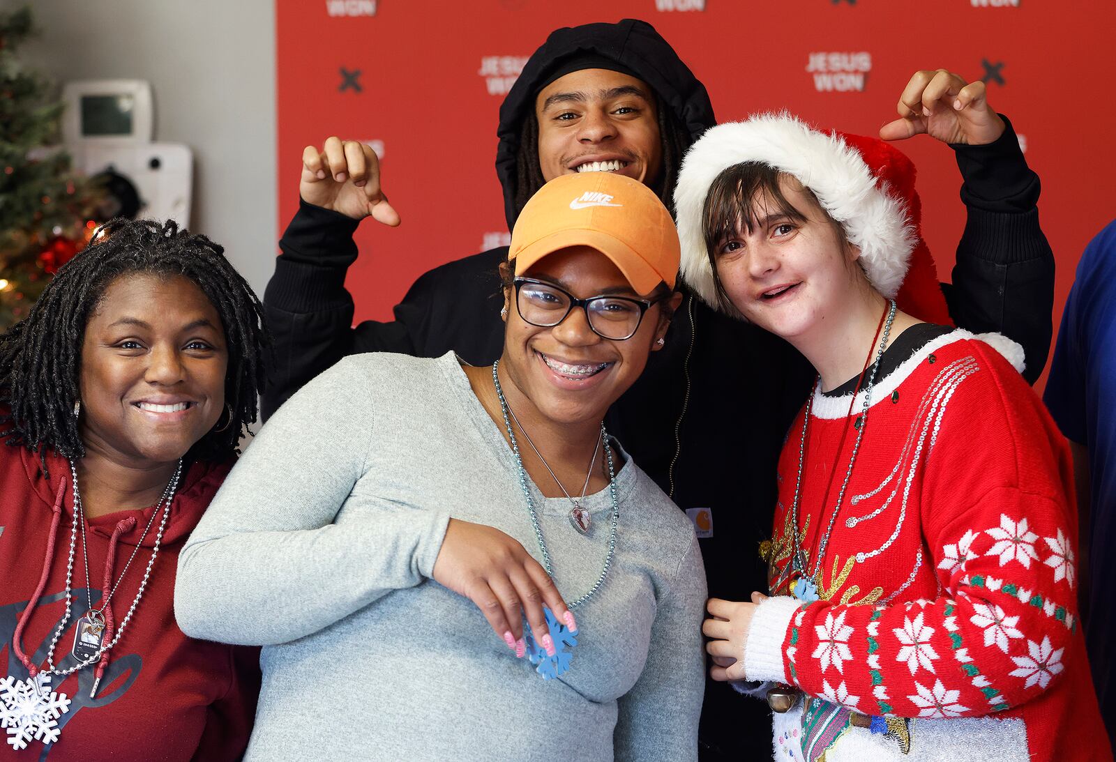 Having fun at the Developmental Disabilities Holiday Party Tuesday, Dec. 3, 2024 at the Christian Life Center, from left, Natina Maxwel, Aries Leslie, Micah Rutledge and Ashtynn Warner. MARSHALL GORBY\STAFF