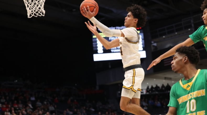 Alter's R.J. Greer goes up for two of his 24 points in Saturday's Division II state semifinal vs. Youngstown Ursuline at UD Arena. Alter won the game 73-37. Photo courtesy of OHSAA