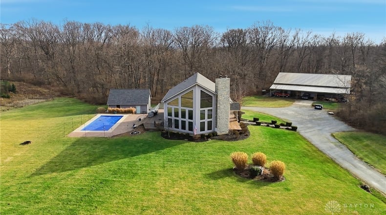 This Sugarcreek Township home sits on 25 acres and has 5,520 square feet of living space, an in ground pool and unfinished walk out basement. CONTRIBUTED