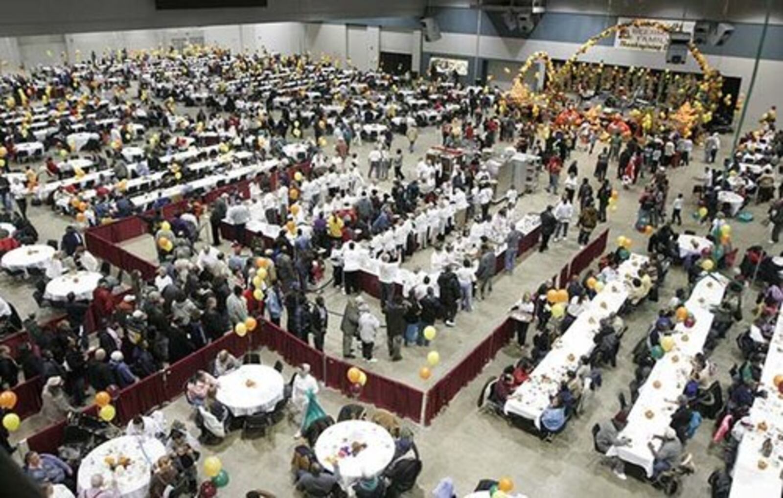 Thousands of people attended the annual Beerman Family Thanksgiving Day Dinner Thursday Nov. 27 at the Dayton Convention Center. Cooks prepared 1,200 pounds of turkey and trimmings for the Dayton tradition which began 40 years ago.