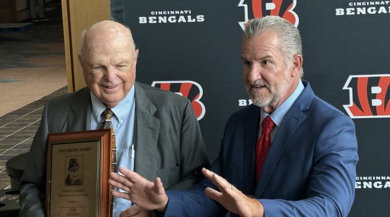 Cincinnati Bengals owner Mike Brown and Lakota West football coach Tom Bolden talk at the Bengals media luncheon on Monday, July 21. Bolden was the 2024 Paul Brown Excellence in Coaching Award winner. LAUREL PFAHLER/CONTRIBUTED PHOTO