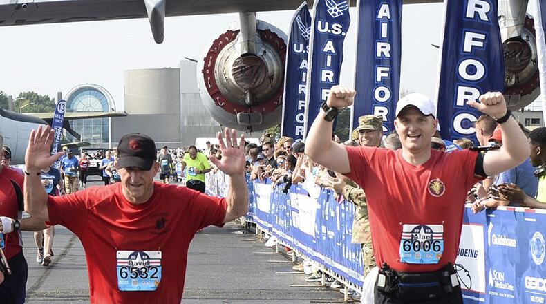 Air Force Chief of Staff Gen. David L. Goldfein crosses the finish line Sept. 21 at the Air Force Half Marathon at Wright-Patterson Air Force Base. Goldfein ran the race to promote the importance of physical fitness for the Air Force. Like many other runners, Goldfein was also running to honor specific airmen, in this case, Staff Sgt. Dylan Elchin a Special Tactics combat controller who was killed in Afghanistan in 2018. Goldfein wore a wristband with Elchin’s name and a T-shirt from the Special Tactic memorial march held earlier this year. (U.S. Air Force photo/Wesley Farnsworth)