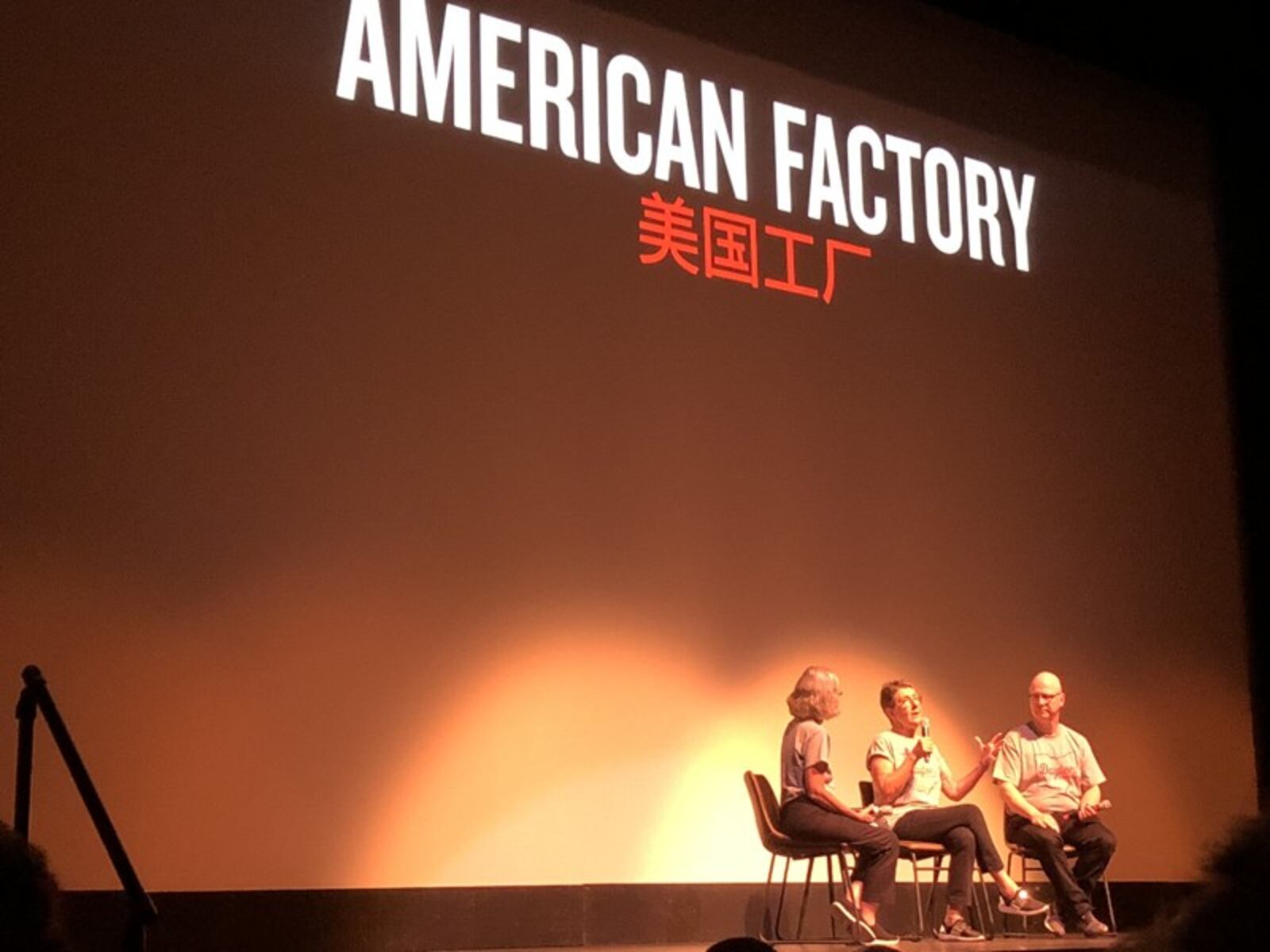 "American Factory" from Oscar-nominated filmmakers Steve Bognar and Julia Reichert made its theatrical debut Monday, Aug. 19 at the Victoria Theatre in downtown Dayton. The Yellow Springs couple is pictured on stage with Neenah Ellis (left), of WYSO FM. AMELIA ROBINSON/STAFF