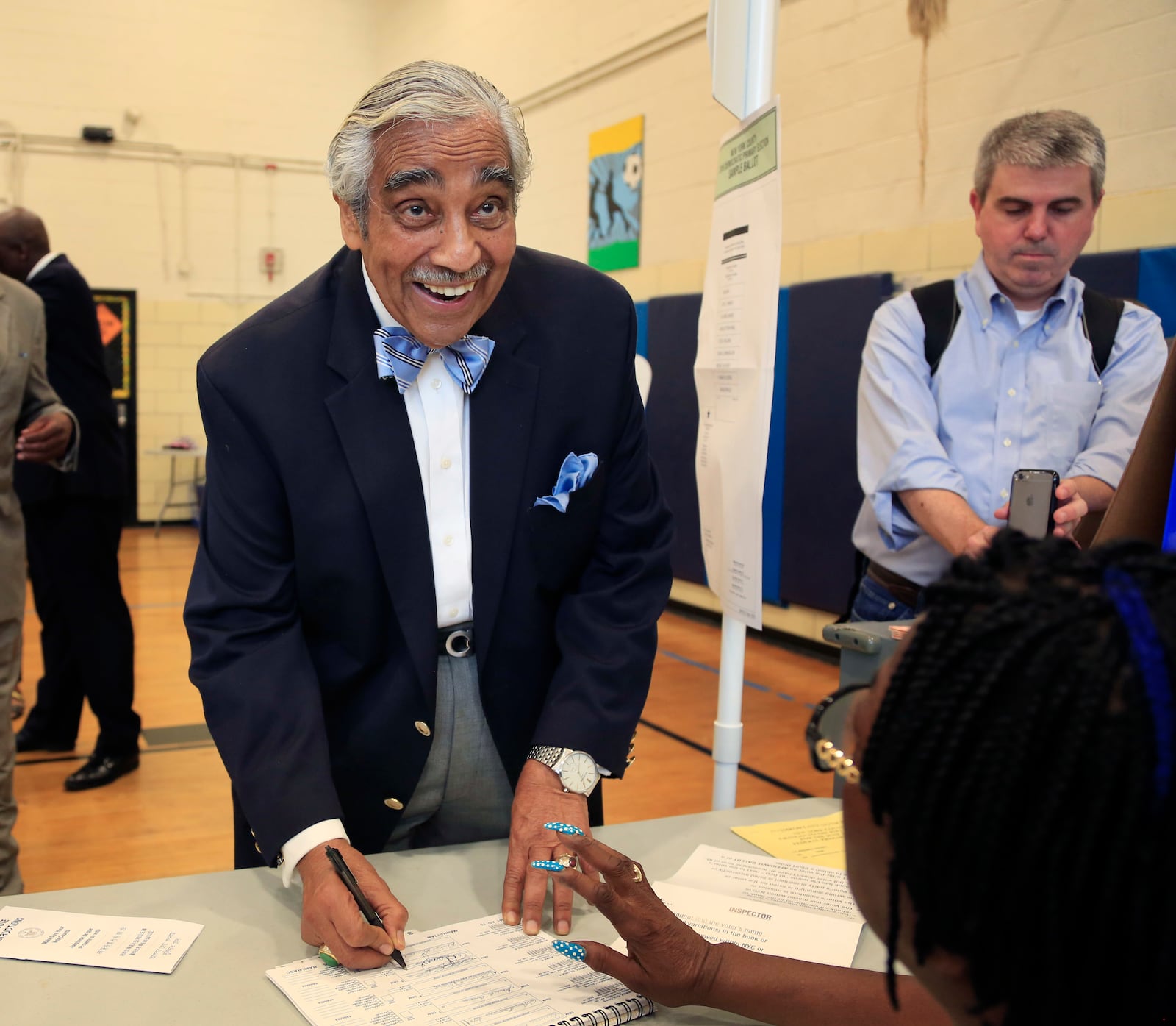 FILE - Harlem Rep. Charles Rangel looks up at reporters while voting in New York, June 28, 2016. (AP Photo/Seth Wenig, File)