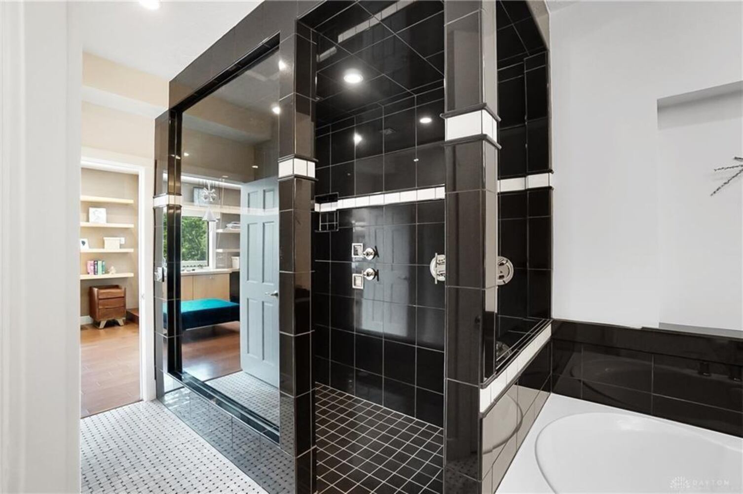 PHOTOS: Spectacular $1.8M luxury home on market with pool, golf simulator