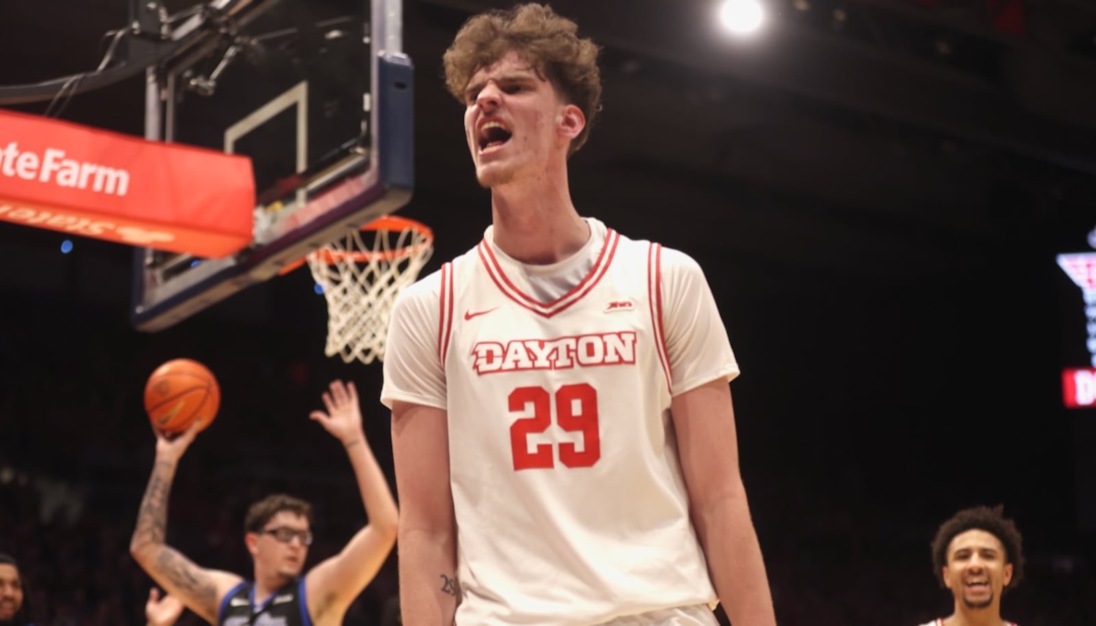 Dayton's Amaël L'Etang reacts after scoring and drawing a foul in the first half against Saint Louis on Tuesday, Feb. 24, 2026, at UD Arena. David Jablonski/Staff