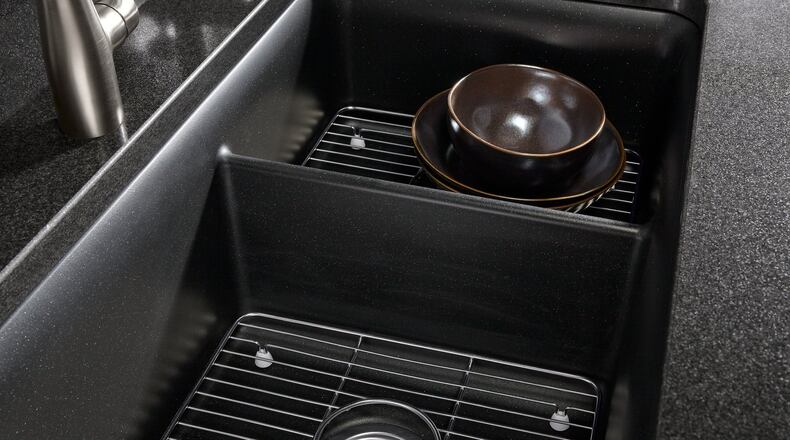 If you re looking for a heavy-duty kitchen sink that offers a lot of bang for the buck, a composite kitchen sink can fill the bill. (Kohler)