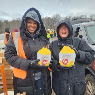 Volunteers help at events such as drive-thru distributions, conducted by The Foodbank Inc. CONTRIBUTED