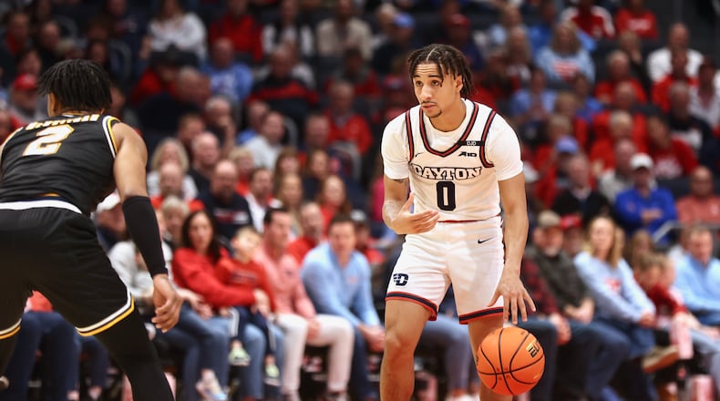 Dayton's Javon Bennett dribbles in the first half against La Salle on Tuesday, Dec. 31, 2024, at UD Arena. David Jablonski/Staff