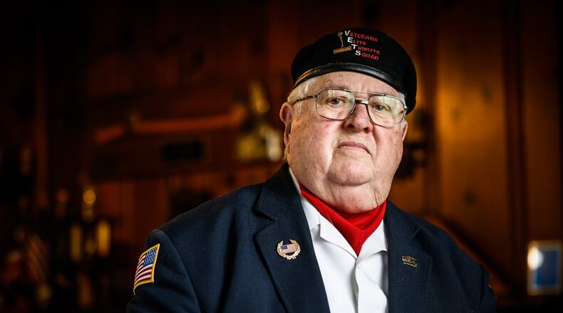 Community Gem Chuck Morris' service didn't end when he left the army years ago, now he serves by honoring those who joined the military before and since, in the veteran's elite tribute squad in Piqua. JIM NOELKER/STAFF