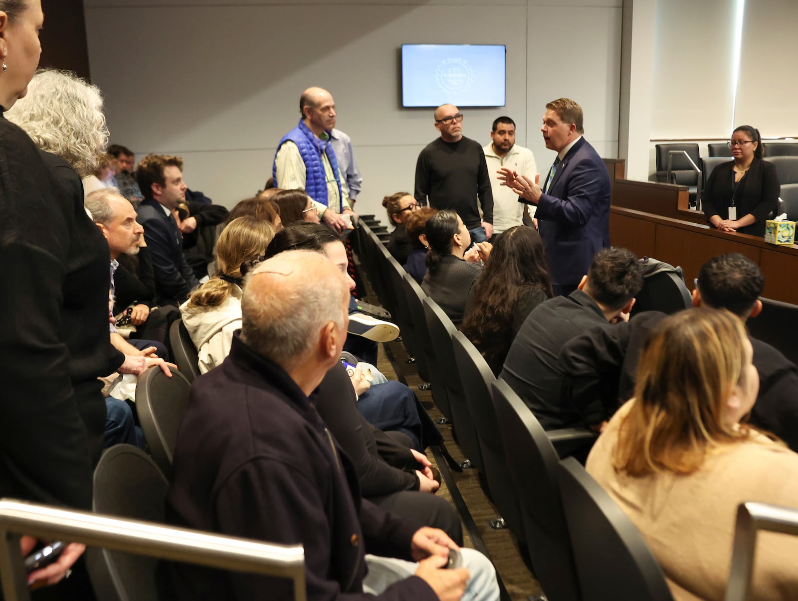 Lake County States Attorney Eric Rinehart speaks with family members and survivors during the sentencing hearing of Robert Crimo III at the Lake County Courthouse, in Waukegan, Ill., on Thursday, April 24, 2025. (Stacey Wescott/Chicago Tribune via AP, Pool)