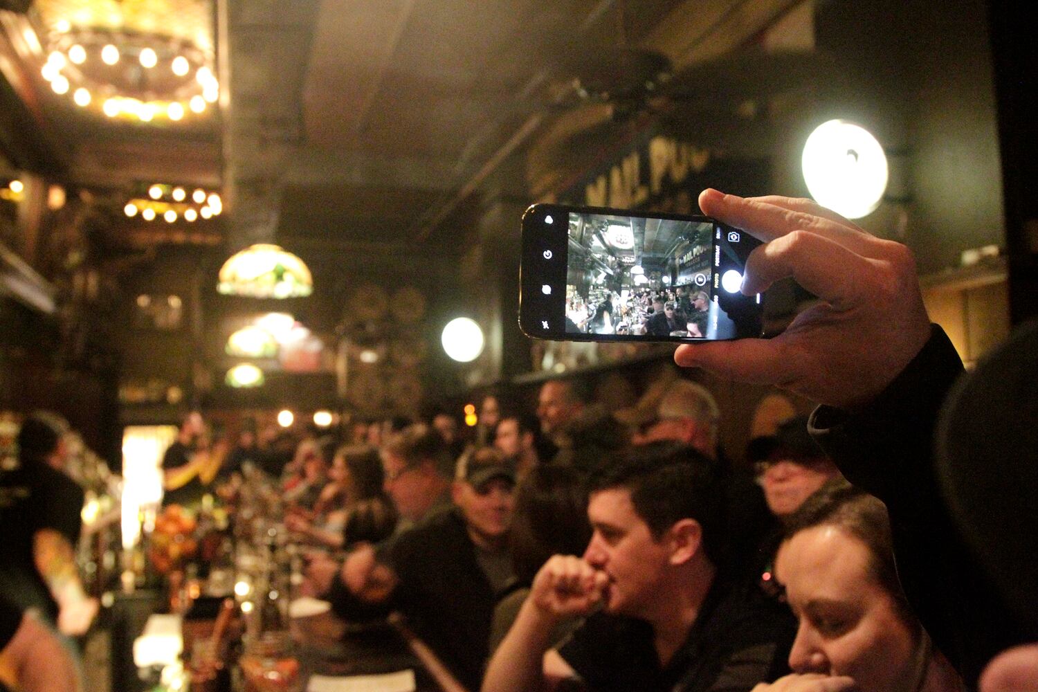 PHOTOS: Revelers pack the Century Bar to say goodbye on New Year’s Eve