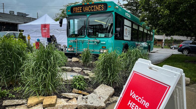 Public Health - Dayton & Montgomery County held a free vaccine clinic at Wheat Penny on a Wayne. The mobile clinics are held in a retrofitted RTA bus. JIM NOELKER\STAFF