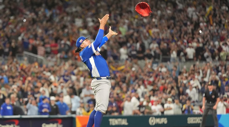 Venezuela pitcher Daniel Palencia celebrates after the team defeated the United States in the championship game of the World Baseball Classic, Tuesday, March 17, 2026, in Miami. (AP Photo/Rebecca Blackwell)