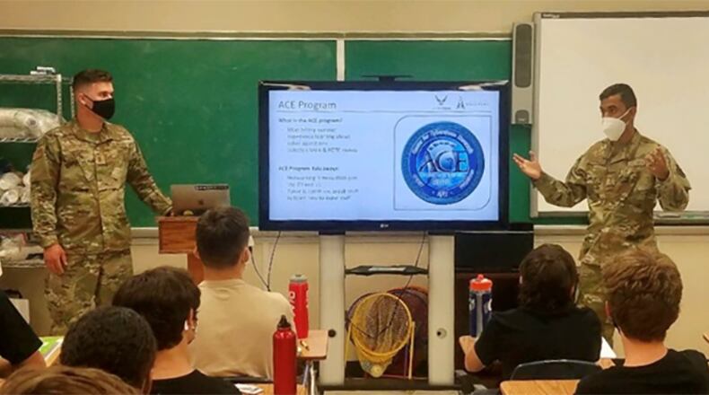 Tilak Bhatnagar (right) is a student in the Air Force Institute of Technology’s annual Advanced Cyber Education program and an incoming cyber officer with the U.S. Air Force. He shared his experience in the ACE program to a group of Civil Air Patrol cadets in August. CONTRIBUTED PHOTO
