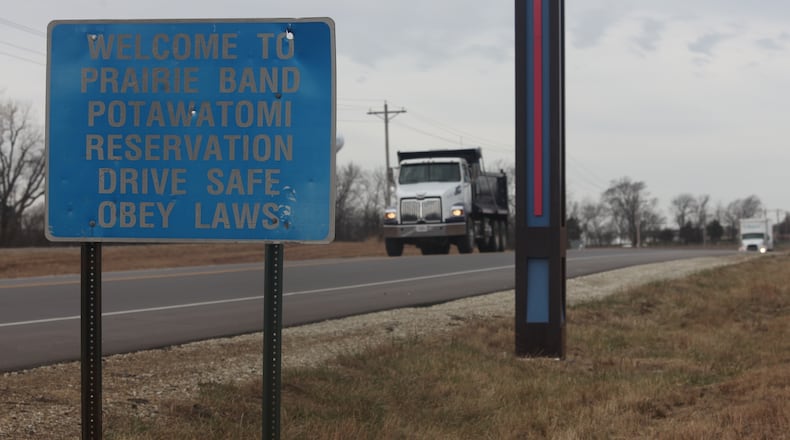 A sign on a road off of U.S. Highway 75 welcomes motorists to the Prairie Band Potawatomi reservation, outside Mayetta, Kan., Thursday, Dec. 11, 2025. (AP Photo/John Hanna)