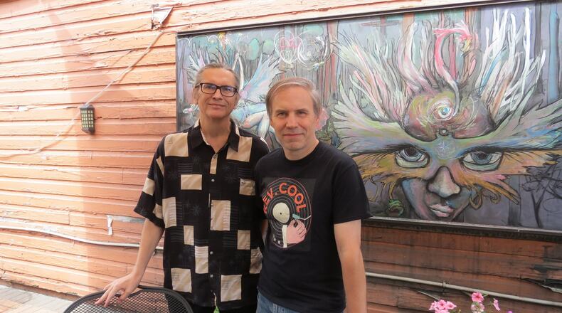 Tony Conley (left) and Andy Valeri have recruited local musicians such as Sandy Bashaw, Mitch Mitchell, Sharon Lane and Tod Weidner for the new fundraising protest music project Dayton Rocks 20/20. CONTRIBUTED