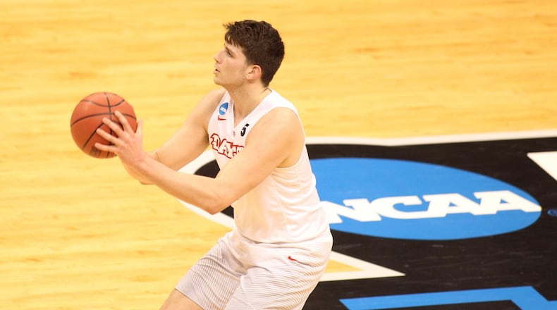 Dayton’s Sam Miller shoots against Wichita State in the first round of the NCAA tournament on March 17, 2017, at Bankers Life Fieldhouse in Indianapolis. David Jablonski/Staff