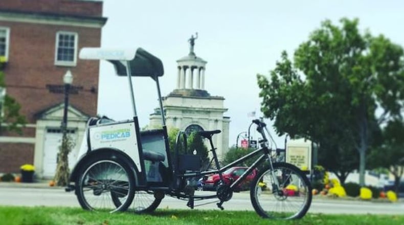One of the new tourist-friendly ways to get around Hamilton is via a Pedal Green Pedicab. CONTRIBUTED